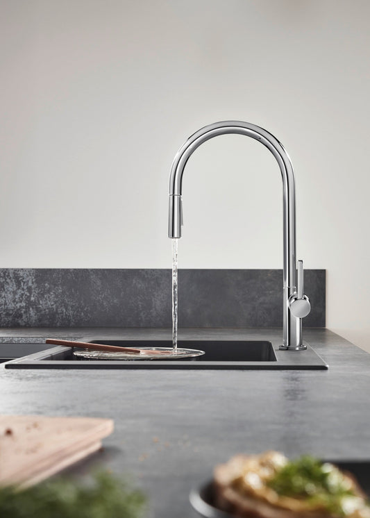 Køkkenarmatur med løbende vand